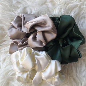 pure mulberry silk scrunchies made in Dubai. Various colours - black, ivory, khaki, navy, cappuccino brown, blush pink